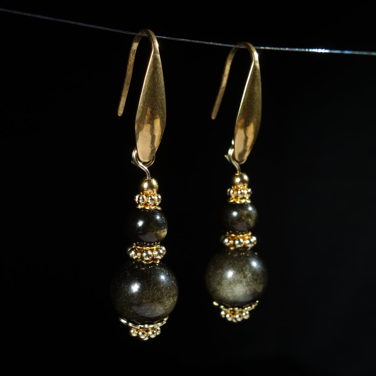 golden-obsidian-earrings-semi-precious-volcanic-glass-beads-pvd-plated-stainless-steel-03544-1